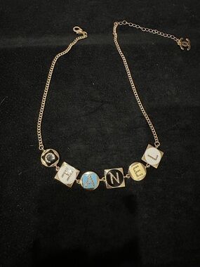 CHANEL Gold-Tone Letter Necklace with Blue, White, Black Inlays